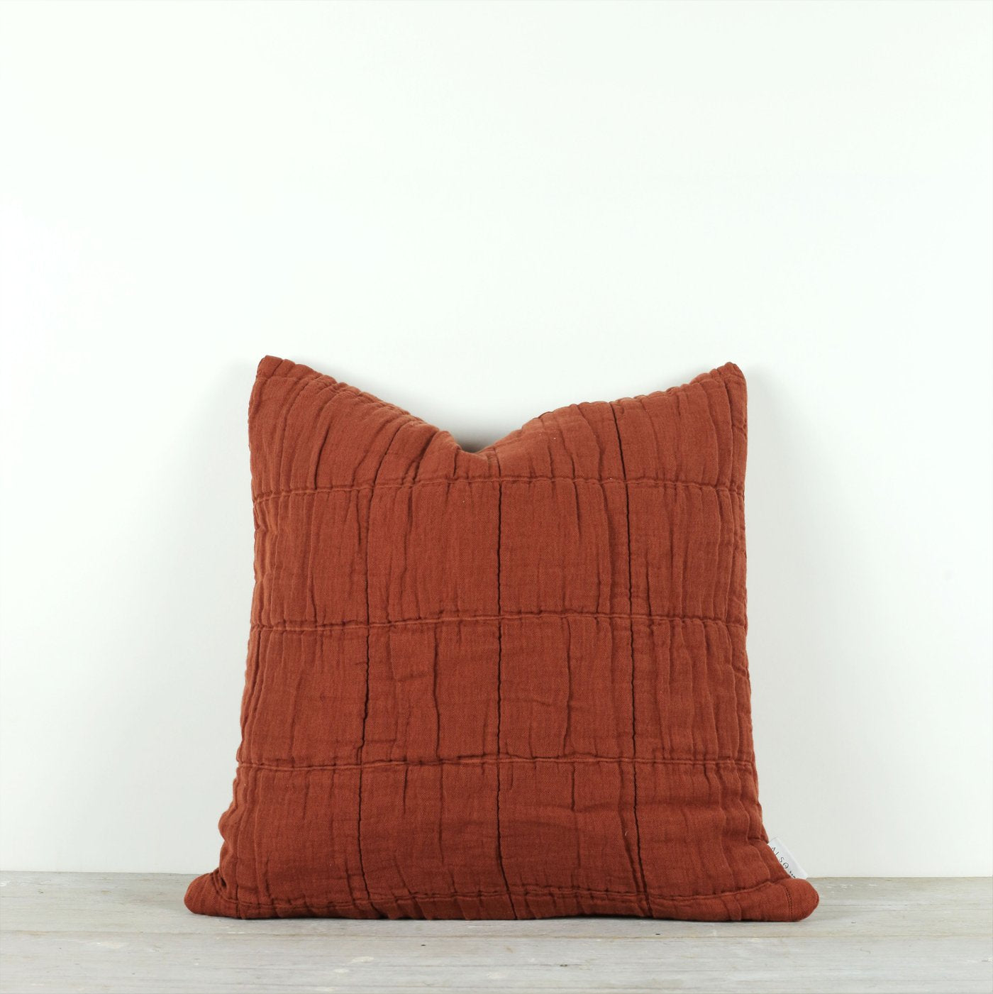 NORA GRID CUSHION - RUST